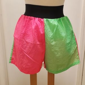 Vintage Size small bi color   parachute shorts with stretch waist.